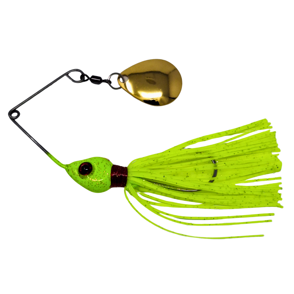 Fishing lure with a gold blade and green skirt on a white background
